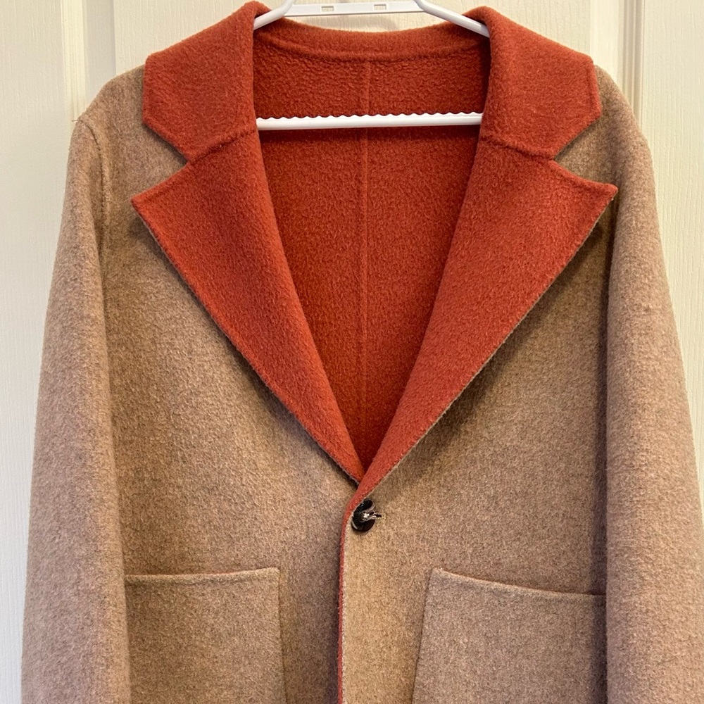Reversible coat,coral orange and beige color in excellent condition.